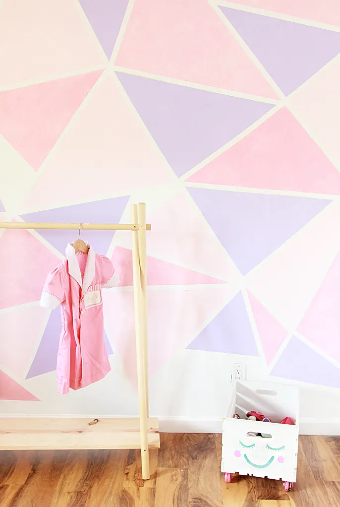 Geometric wall paint has become a popular trend in interior design, offering a unique and visually striking way to transform living spaces.